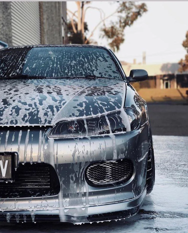 Foam running down the front of a sports car